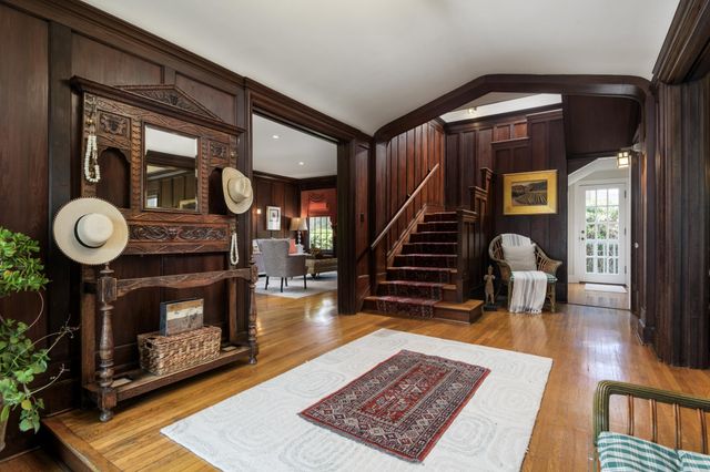 a view of swimming pool with outdoor seating and plants
