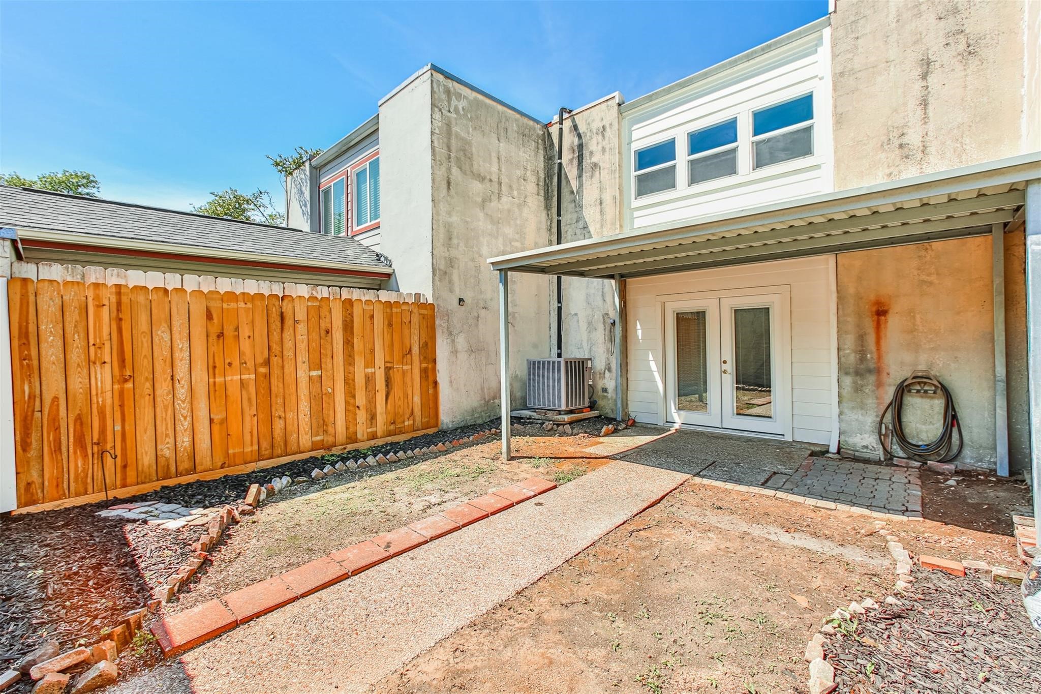 1255 Blalock Road, Unit 9 Houston, TX 77055 - Photo 15 of 15 a front view of a house with yard