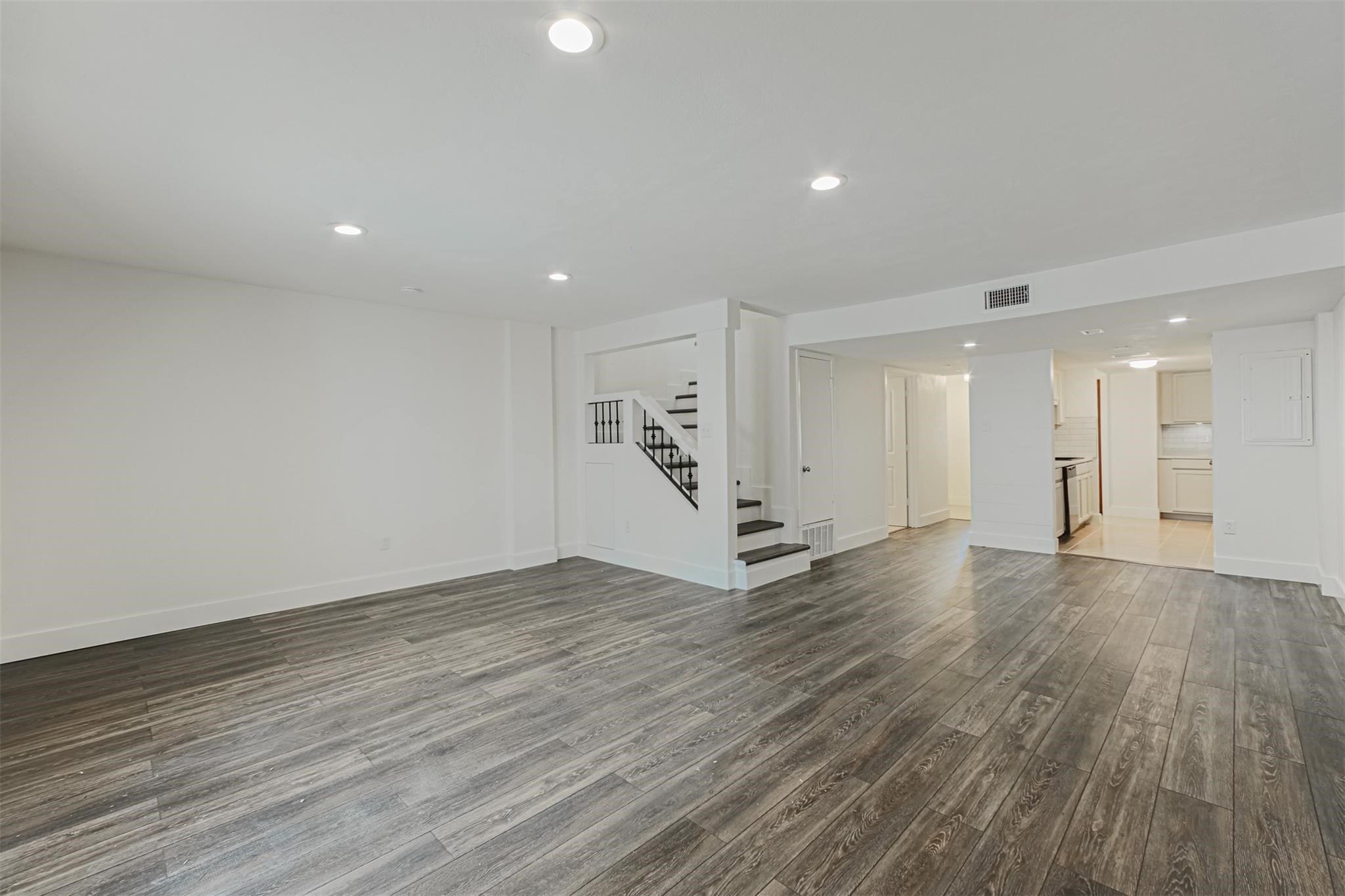1255 Blalock Road, Unit 9 Houston, TX 77055 - Photo 10 of 15 a view of an empty room with wooden floor