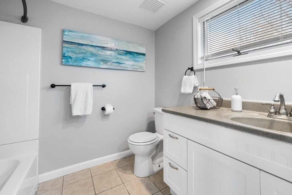 81 West Main Street Merrimac, MA 01860 - Photo 11 of 28 a bathroom with a sink and a toilet