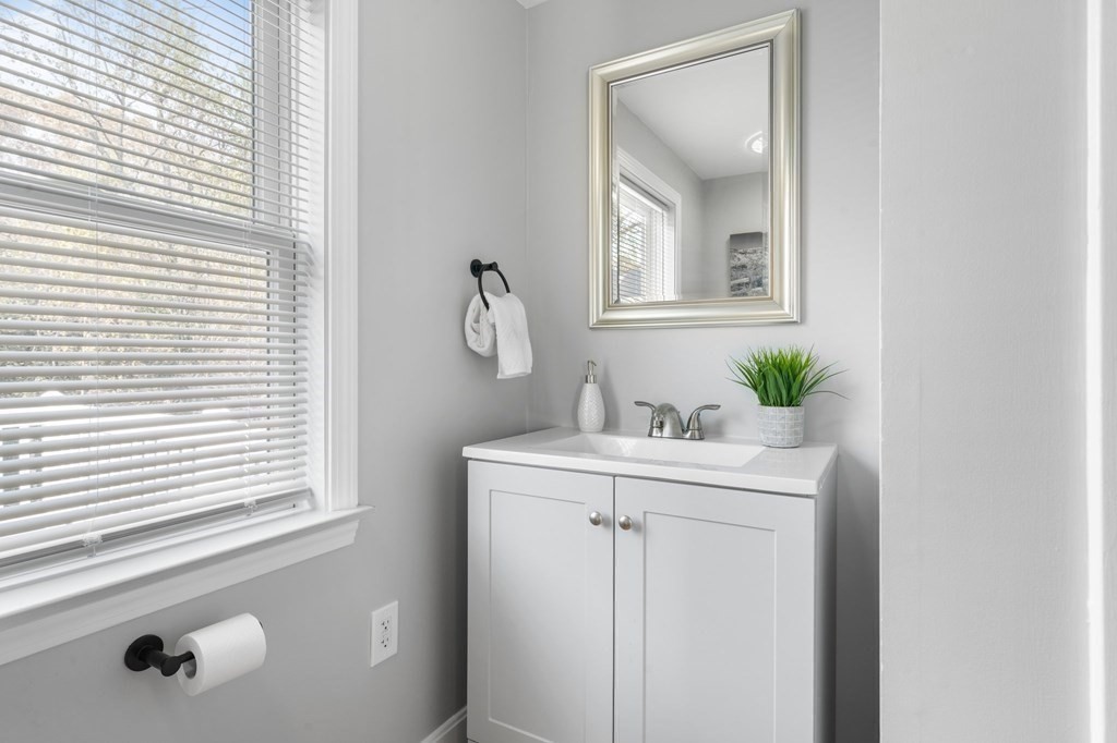 81 West Main Street Merrimac, MA 01860 - Photo 12 of 28 a bathroom with a sink and a mirror