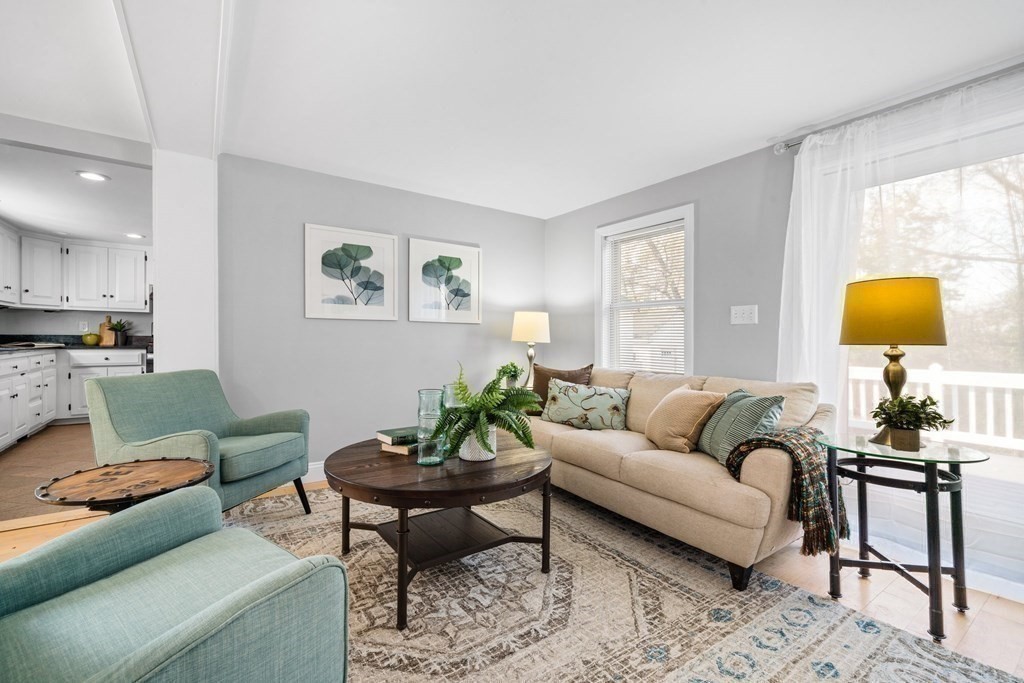 81 West Main Street Merrimac, MA 01860 - Photo 16 of 28 a living room with furniture and a potted plant