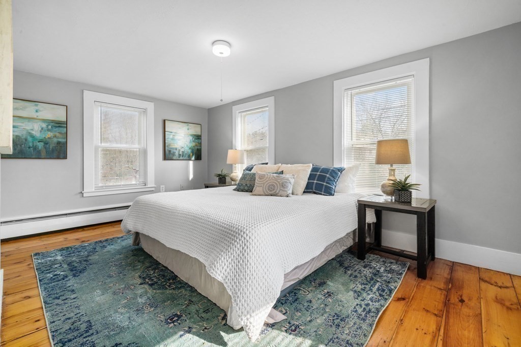 81 West Main Street Merrimac, MA 01860 - Photo 19 of 28 a bedroom with a bed and window