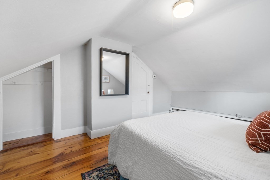 81 West Main Street Merrimac, MA 01860 - Photo 24 of 28 a bedroom with a bed and a window