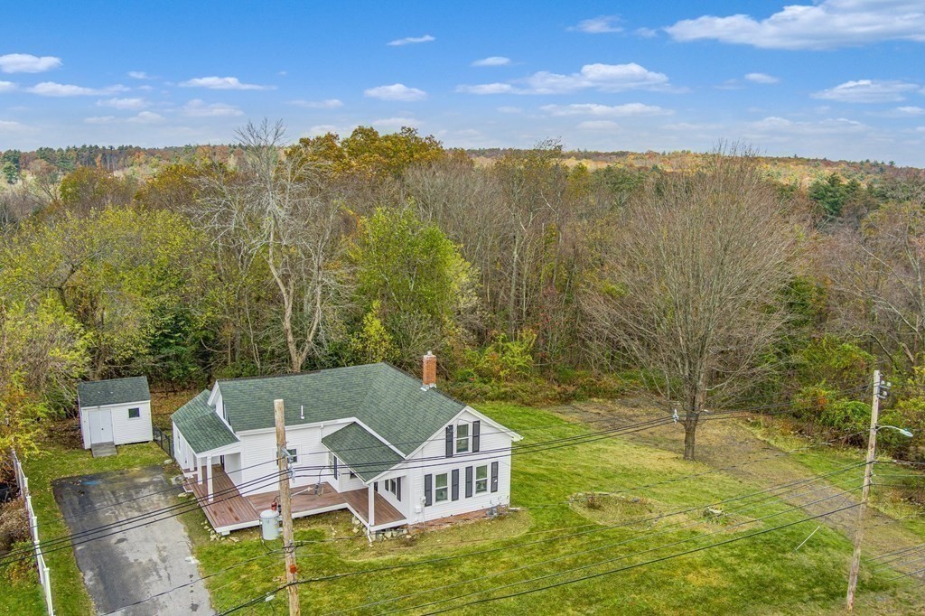 81 West Main Street Merrimac, MA 01860 - Photo 3 of 28 a view of a balcony with chair and table
