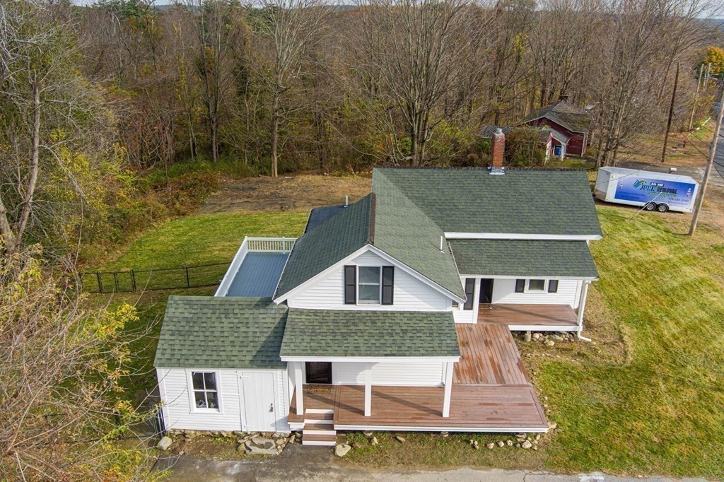 81 West Main Street Merrimac, MA 01860 - Photo 4 of 28 aerial view of a house with a yard