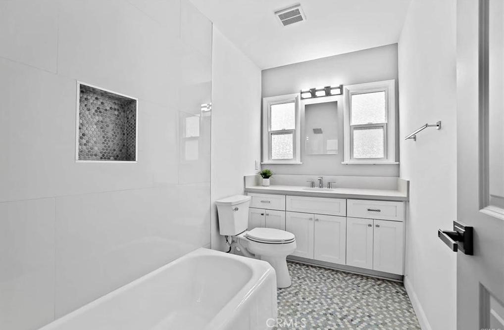100 Eastern Pasadena, CA 91107 - Photo 12 of 18 a bathroom with a sink a toilet and shower