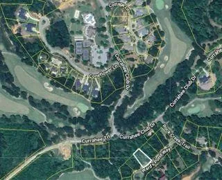 a view of a swimming pool with a yard