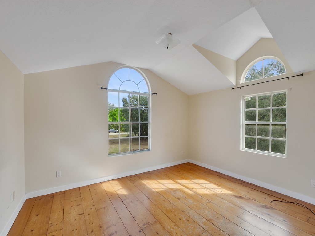 167 Deer Run Road Palm Bay, FL 32909 - Photo 23 of 35 an empty room with a window