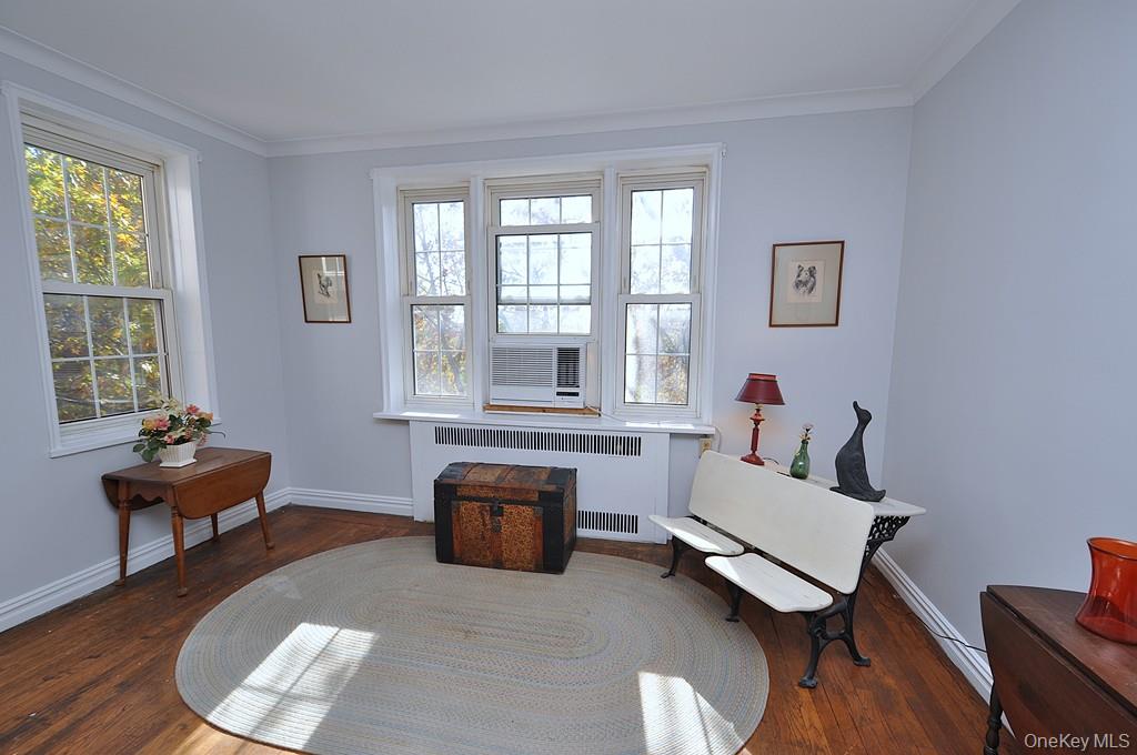 949 Palmer Road, Unit 6H Bronxville, NY 10708 - Photo 23 of 48 a living room with furniture and a window