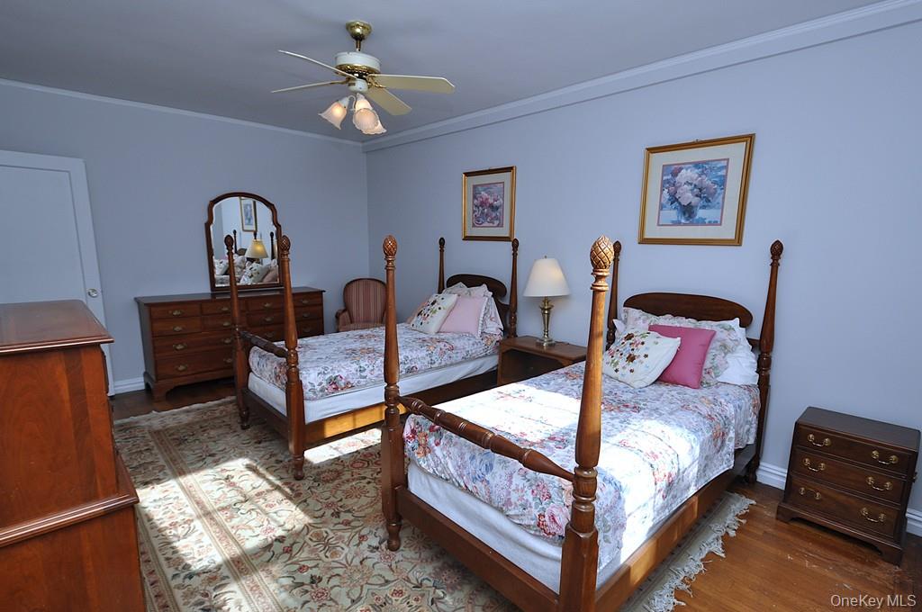 949 Palmer Road, Unit 6H Bronxville, NY 10708 - Photo 25 of 48 a bedroom with furniture and a window