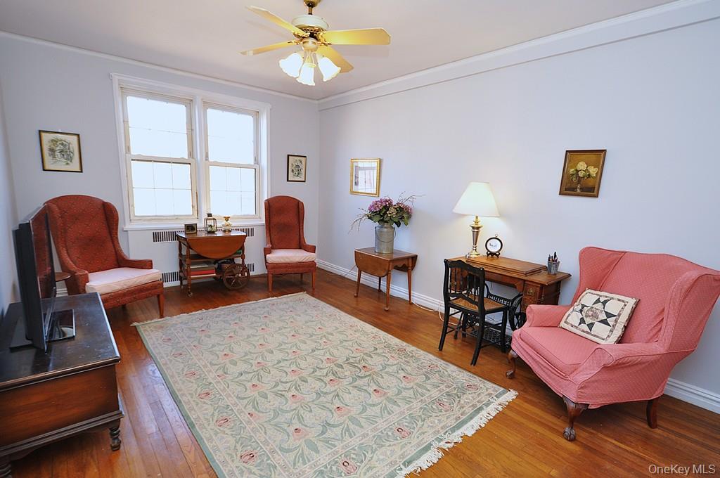949 Palmer Road, Unit 6H Bronxville, NY 10708 - Photo 30 of 48 a living room with furniture and a window