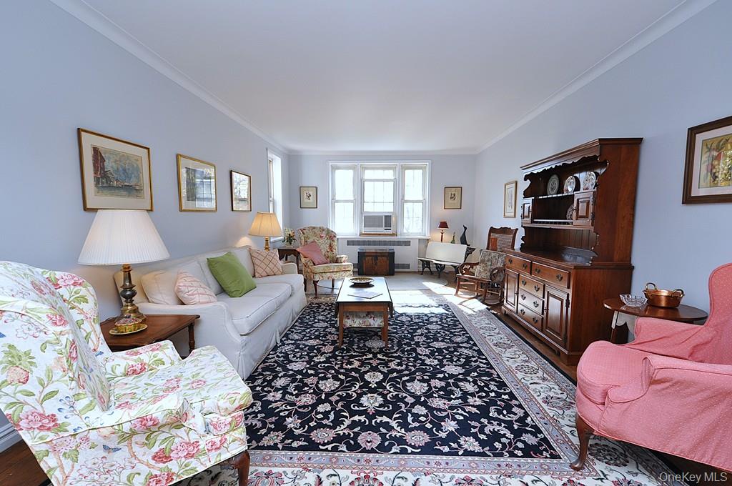 949 Palmer Road, Unit 6H Bronxville, NY 10708 - Photo 38 of 48 a living room with furniture or couch and a flat screen tv