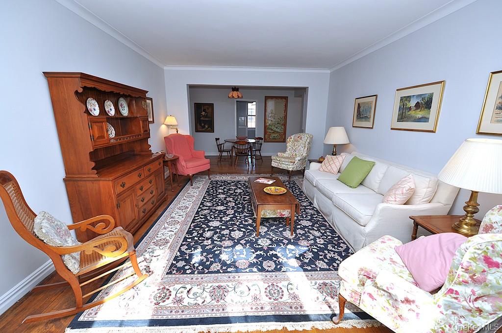 949 Palmer Road, Unit 6H Bronxville, NY 10708 - Photo 39 of 48 a living room with furniture and a flat screen tv