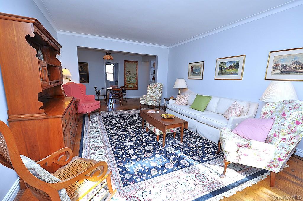 949 Palmer Road, Unit 6H Bronxville, NY 10708 - Photo 40 of 48 a living room with furniture rug and wooden floor