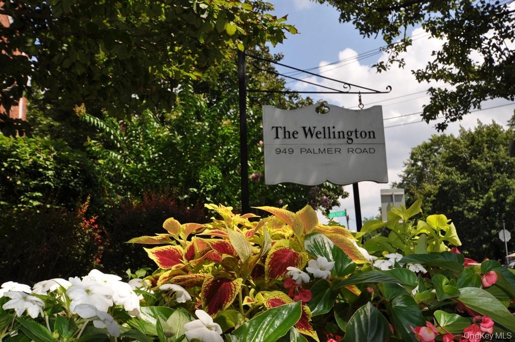 949 Palmer Road, Unit 6H Bronxville, NY 10708 - Photo 4 of 48 a sign that is sitting in front of flowers