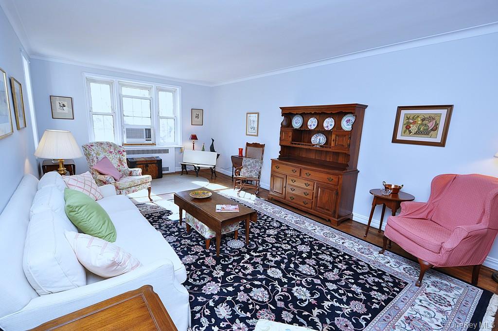 949 Palmer Road, Unit 6H Bronxville, NY 10708 - Photo 6 of 48 a living room with furniture or couch and a window