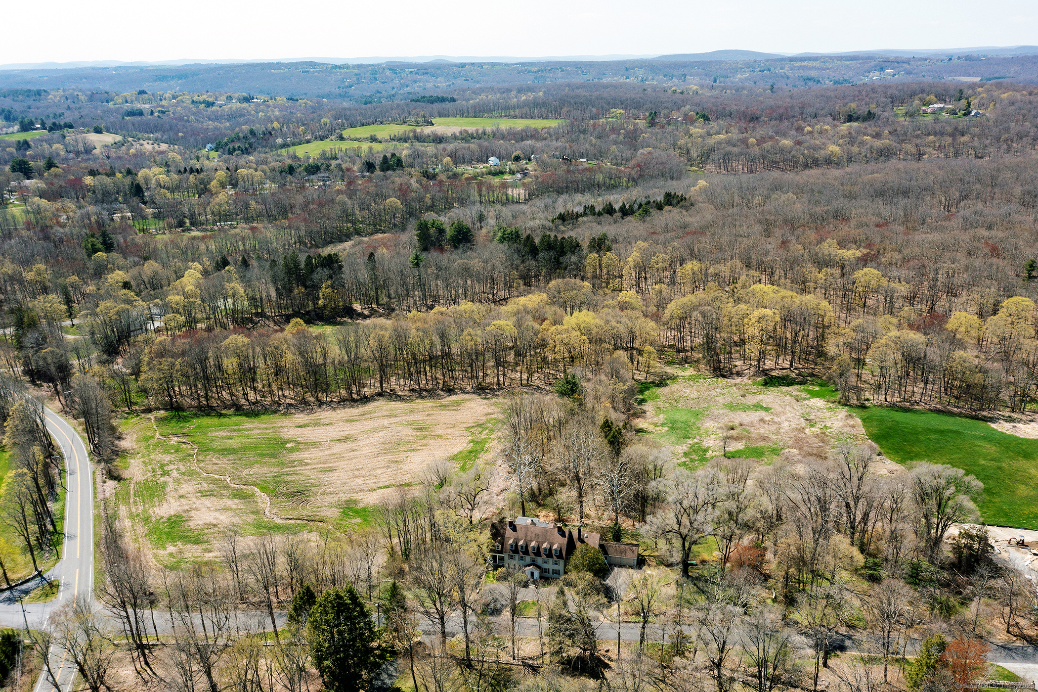 45 Sunny Ridge Road Washington, CT 06794 - Photo 2 of 15 a view of a yard with an outdoor space