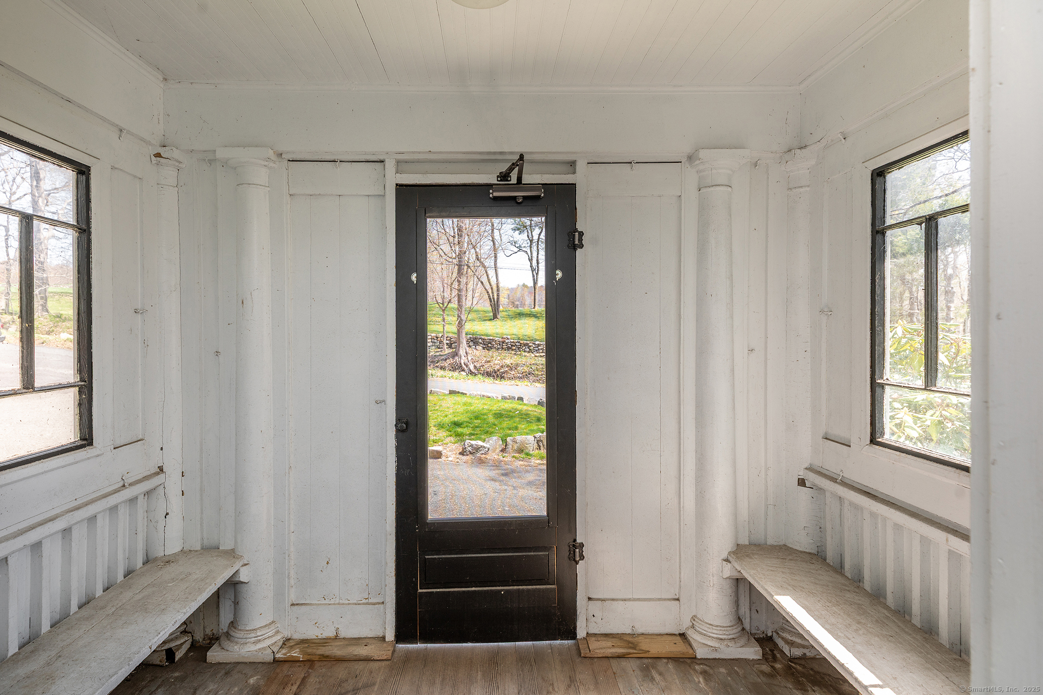 45 Sunny Ridge Road Washington, CT 06794 - Photo 5 of 15 a view of entryway with window and wooden floor