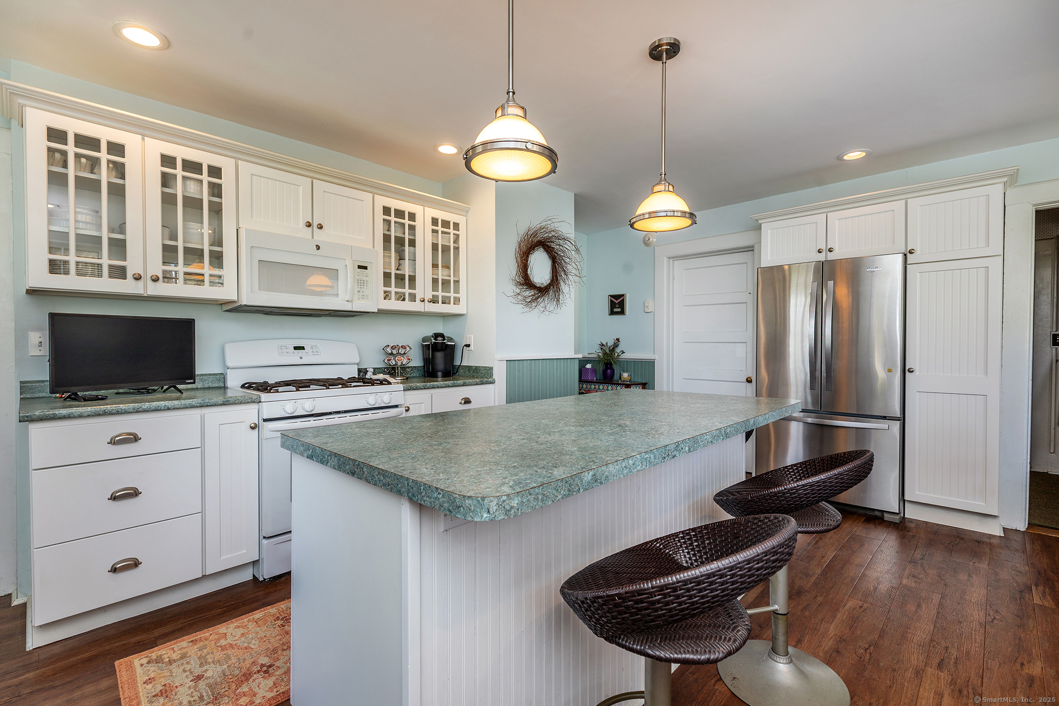 45 Sunny Ridge Road Washington, CT 06794 - Photo 7 of 15 a kitchen with stainless steel appliances granite countertop a stove a sink and a refrigerator