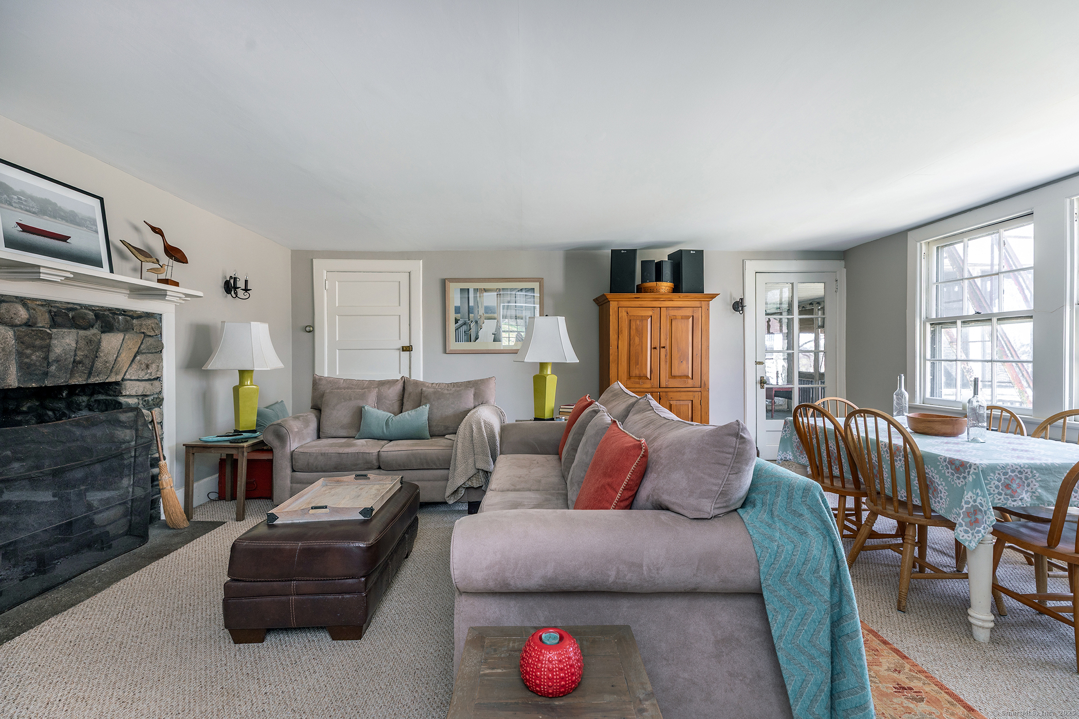 45 Sunny Ridge Road Washington, CT 06794 - Photo 9 of 15 a living room with furniture a fireplace and a large window