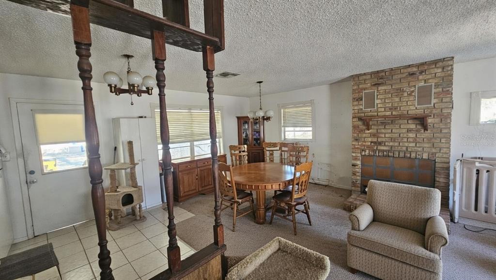 43734 West Lane Paisley, FL 32767 - Photo 6 of 38 a view of a livingroom with furniture and windows