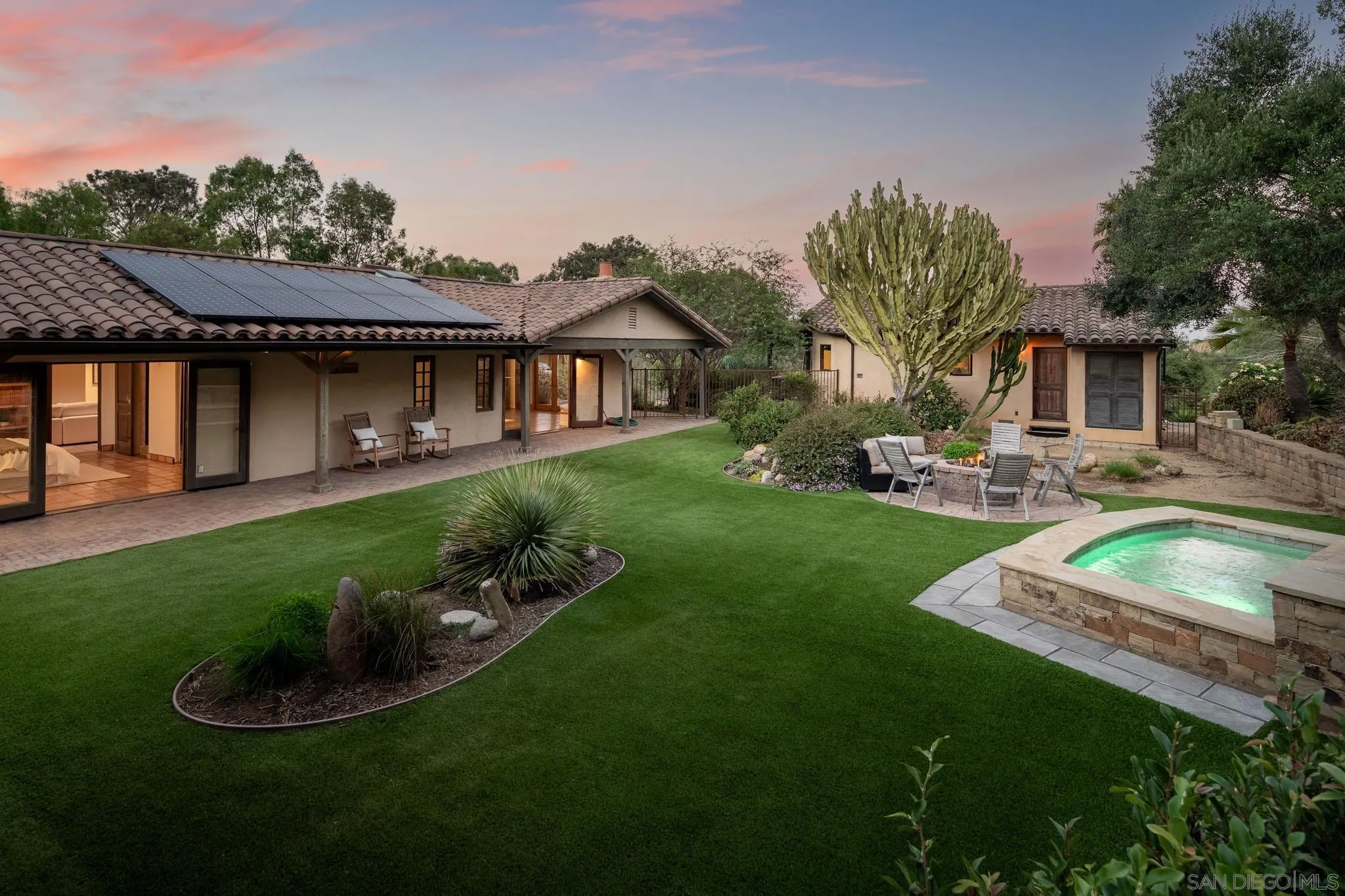 1243 Crest Drive Encinitas, CA 92024 - Photo 23 of 47 a front view of a house with garden