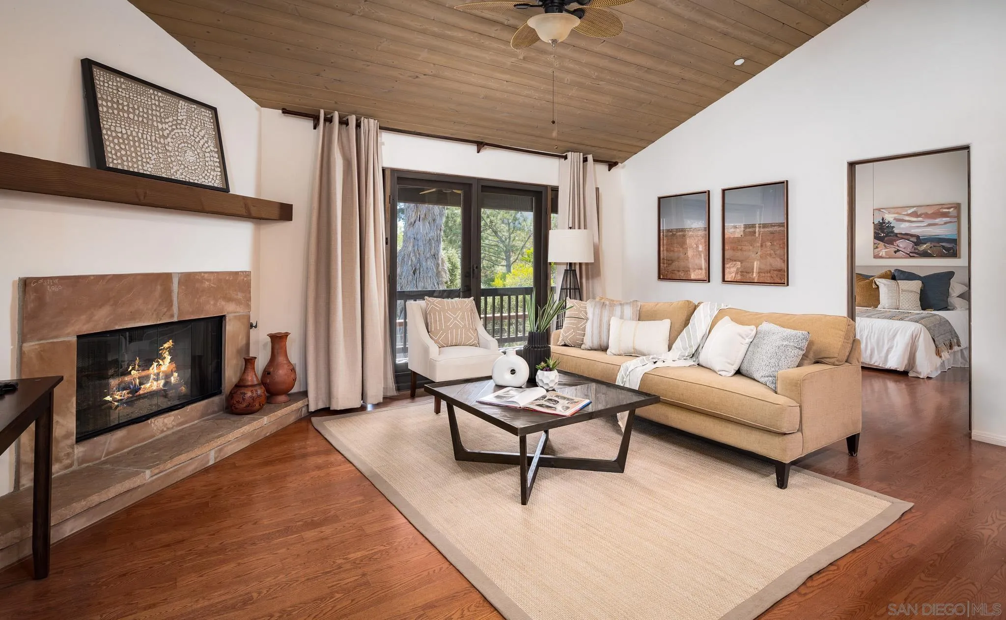 1243 Crest Drive Encinitas, CA 92024 - Photo 30 of 47 a living room with furniture and a fireplace