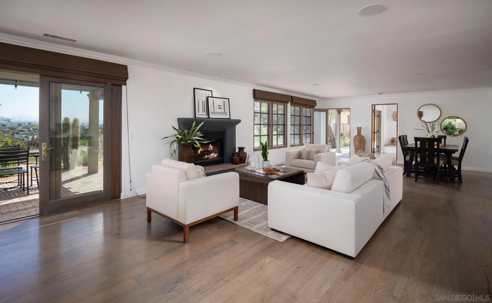 1243 Crest Drive Encinitas, CA 92024 - Photo 5 of 47 a living room with furniture and a large window