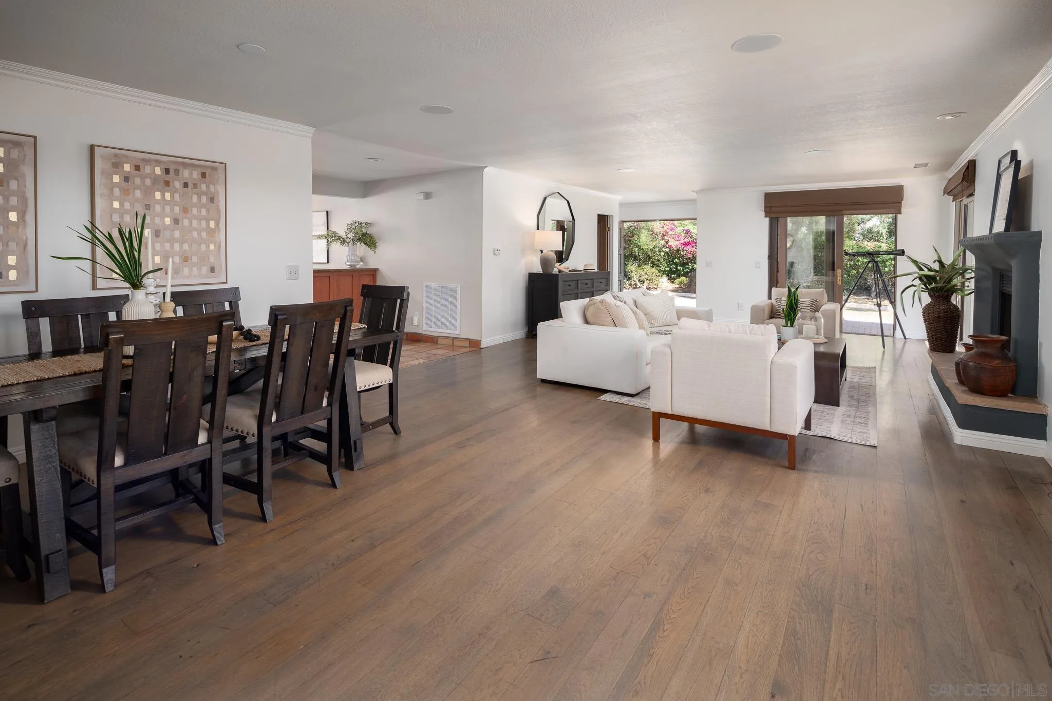 1243 Crest Drive Encinitas, CA 92024 - Photo 6 of 47 a living room with furniture and a wooden floor