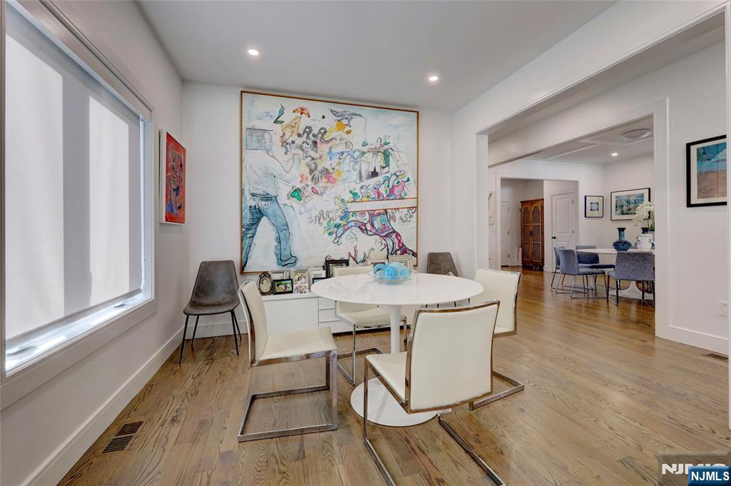 63 Sunset Lane Tenafly, NJ 07670 - Photo 12 of 20 a view of a dining room with furniture window and wooden floor