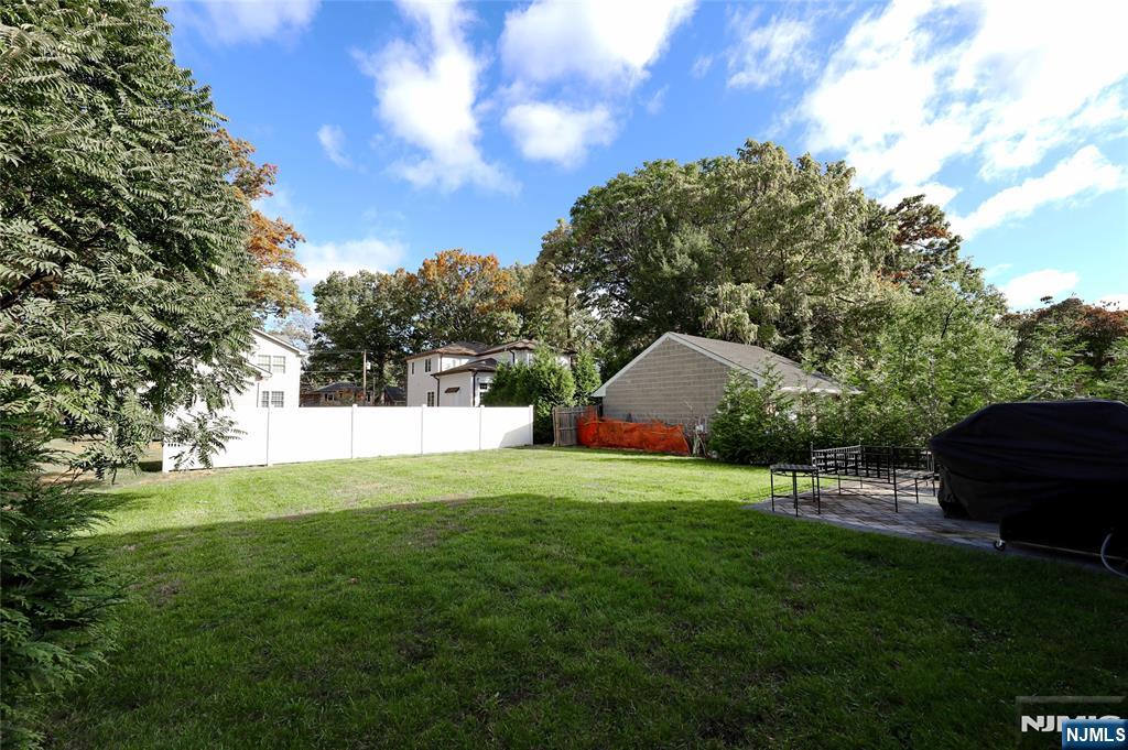 63 Sunset Lane Tenafly, NJ 07670 - Photo 2 of 20 a view of a back yard