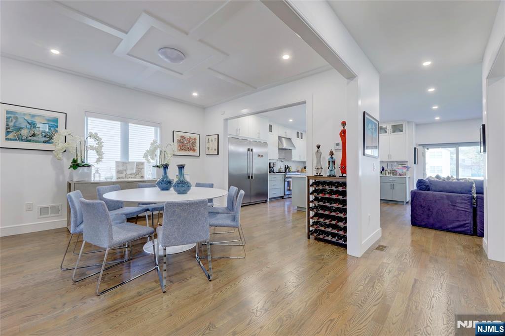 63 Sunset Lane Tenafly, NJ 07670 - Photo 7 of 20 a dining room with furniture and wooden floor
