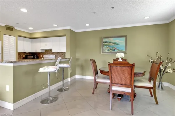 a view of kitchen with breakfast area