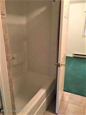 a bathroom with a bathtub