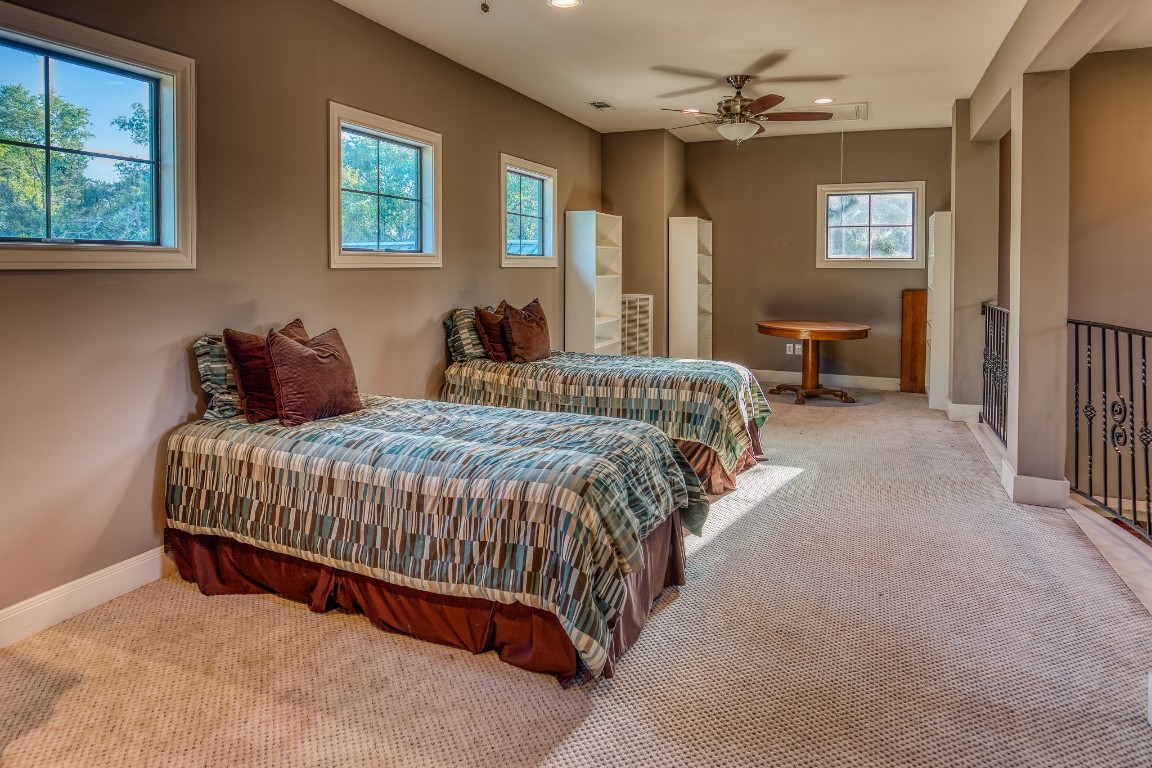 6925 South Sycamore Crossing Road Bellville, TX 77418 - Photo 20 of 40 a bedroom with bed and window
