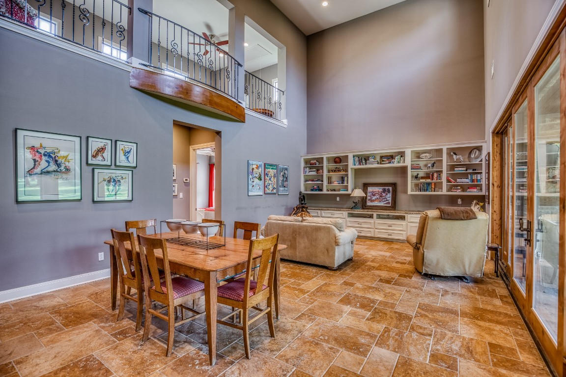 6925 South Sycamore Crossing Road Bellville, TX 77418 - Photo 23 of 40 a dining room with furniture and chandelier