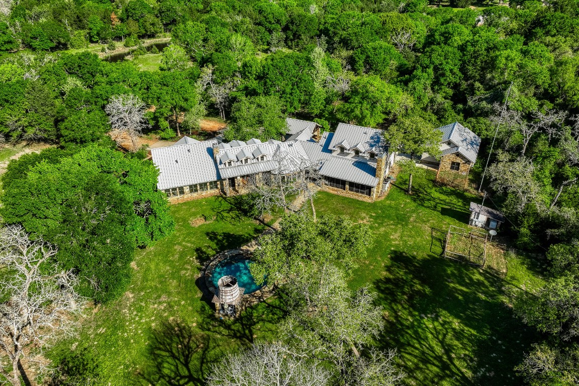 6925 South Sycamore Crossing Road Bellville, TX 77418 - Photo 38 of 40 an aerial view of a house with a yard