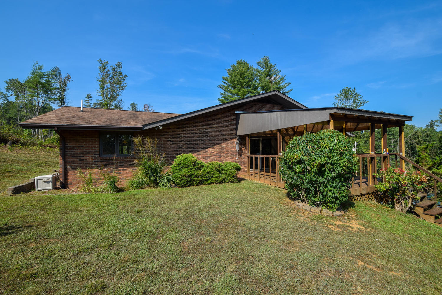 211 Rhododendron Road Callaway, VA 24067 - Photo 2 of 48 a view of a house with a yard