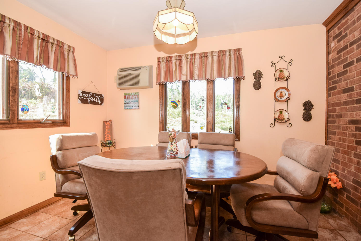 211 Rhododendron Road Callaway, VA 24067 - Photo 12 of 48 a dining room with furniture and window