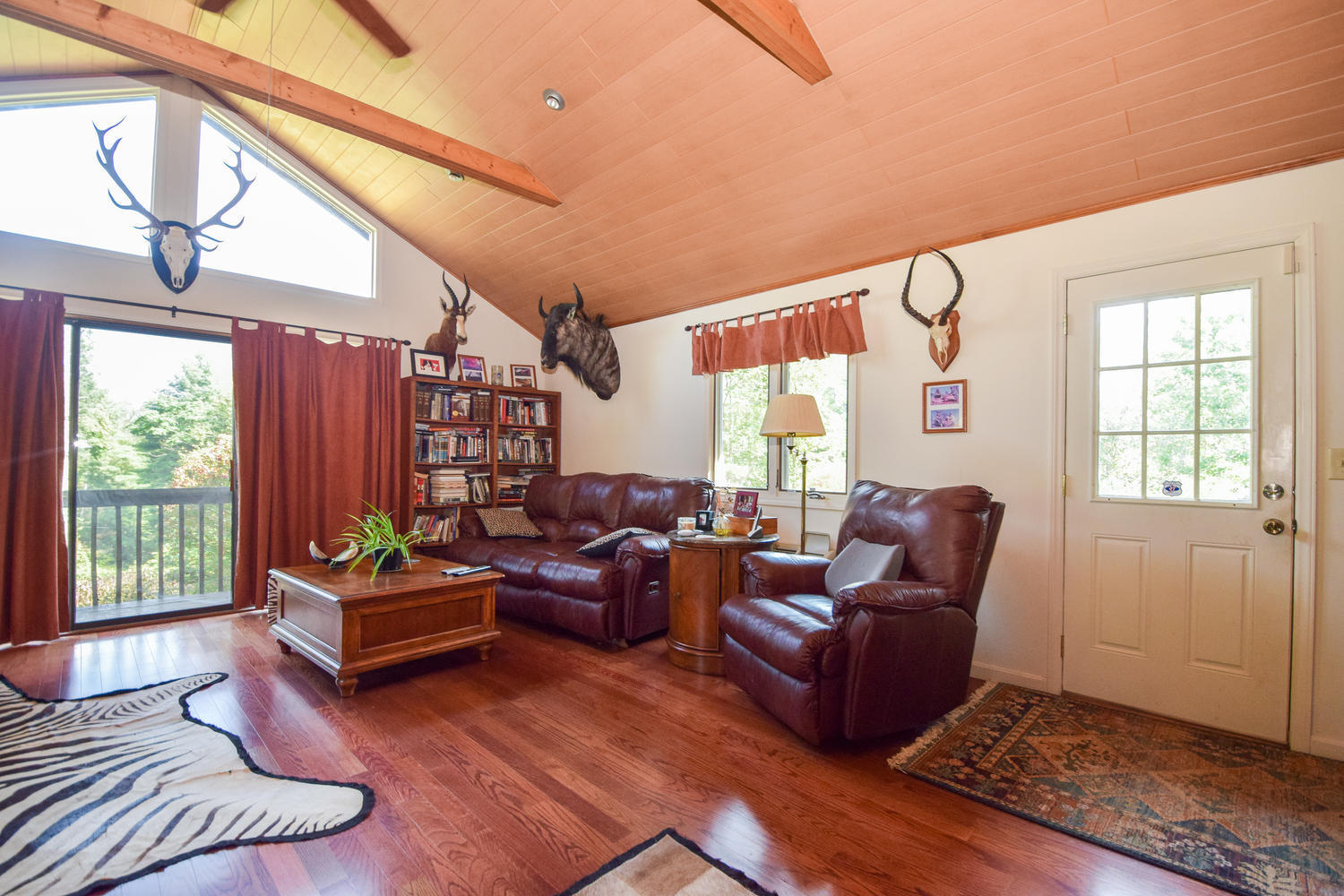 211 Rhododendron Road Callaway, VA 24067 - Photo 19 of 48 a living room with furniture and a window
