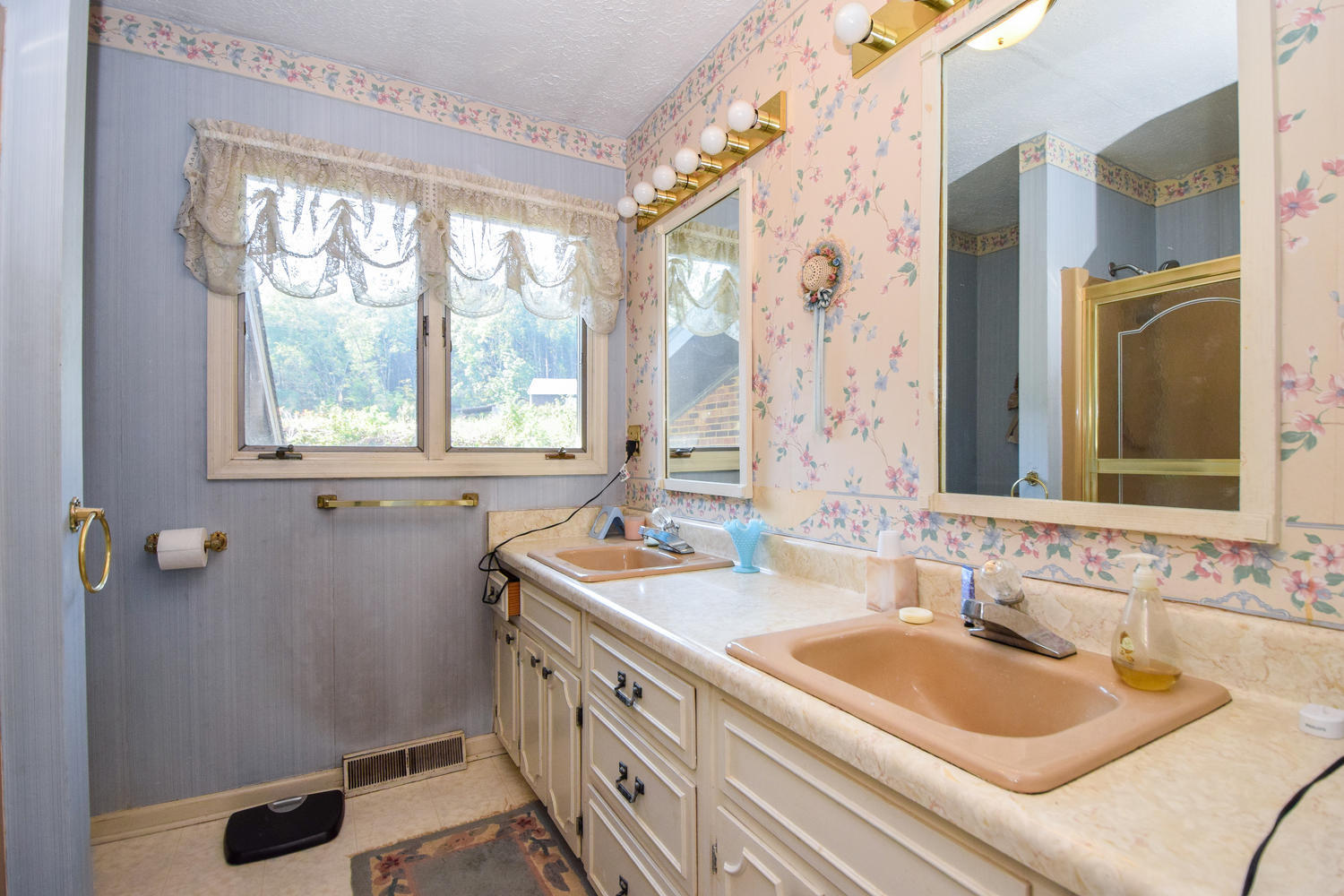 211 Rhododendron Road Callaway, VA 24067 - Photo 28 of 48 a bathroom with a sink and a window