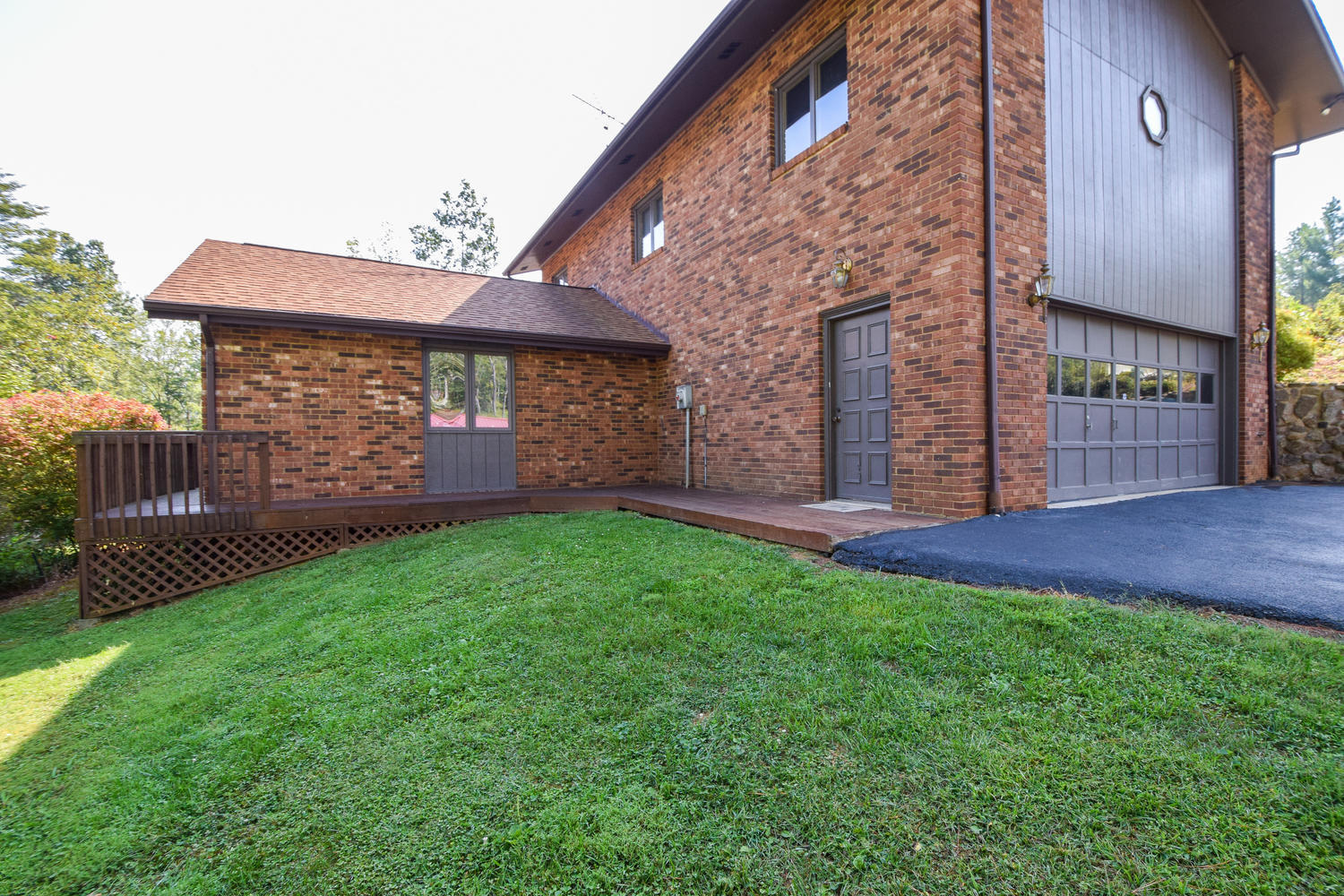 211 Rhododendron Road Callaway, VA 24067 - Photo 33 of 48 a view of a house with a yard
