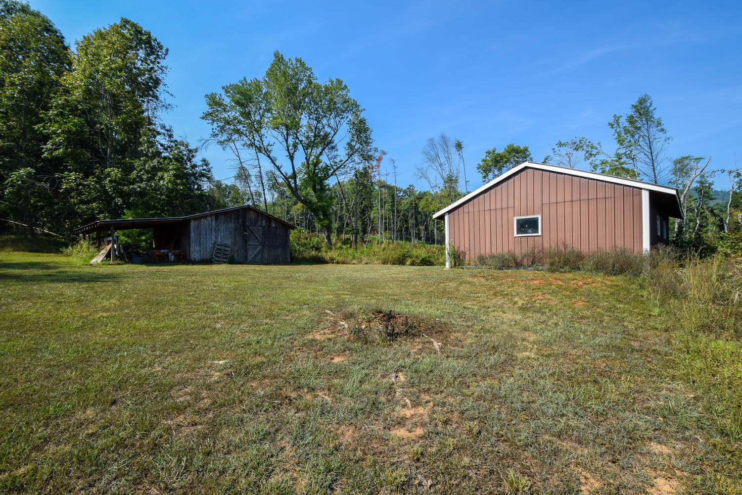 211 Rhododendron Road Callaway, VA 24067 - Photo 36 of 48 a house view with garden space