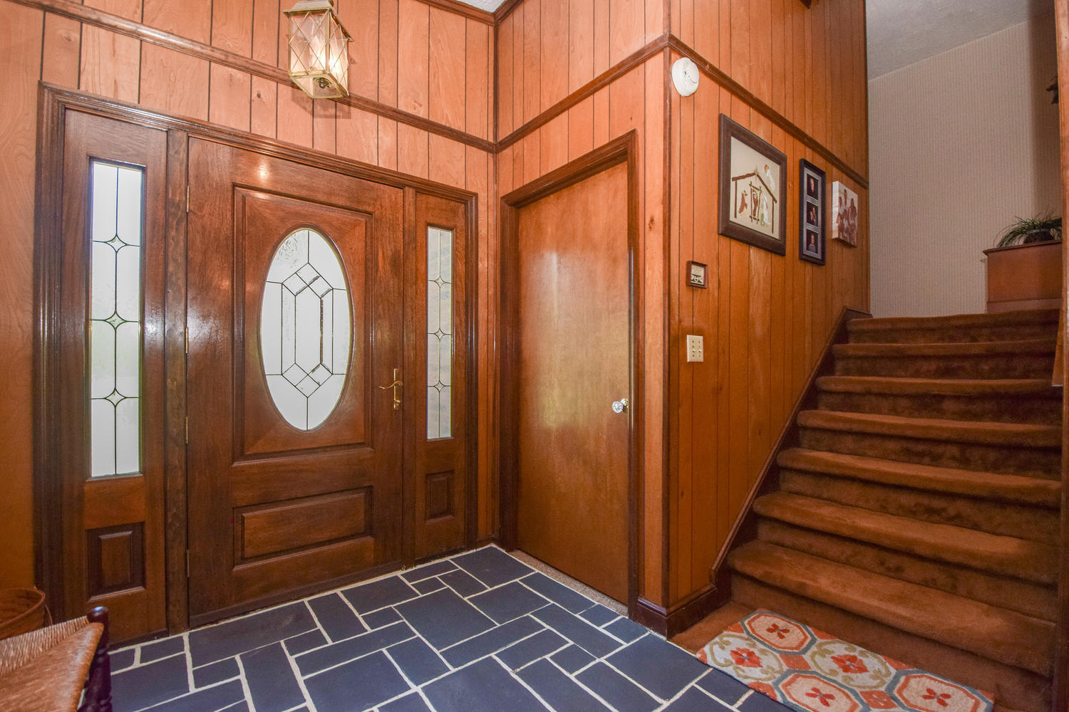 211 Rhododendron Road Callaway, VA 24067 - Photo 8 of 48 a view of a door and wooden walls
