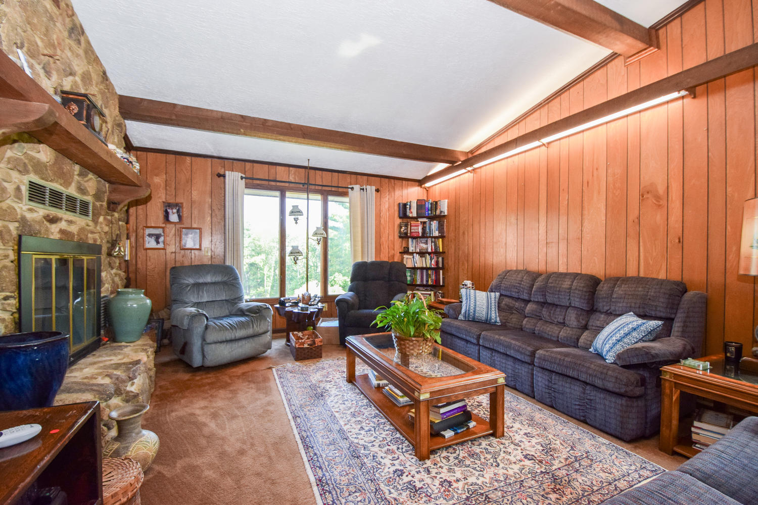 211 Rhododendron Road Callaway, VA 24067 - Photo 10 of 48 a living room with furniture and a large window