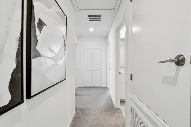 a view of a livingroom with washer and dryer