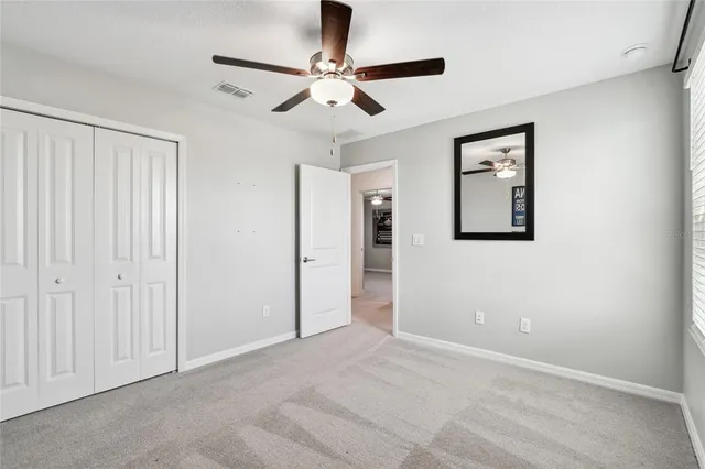 a bathroom with a double vanity sink mirror and bathtub