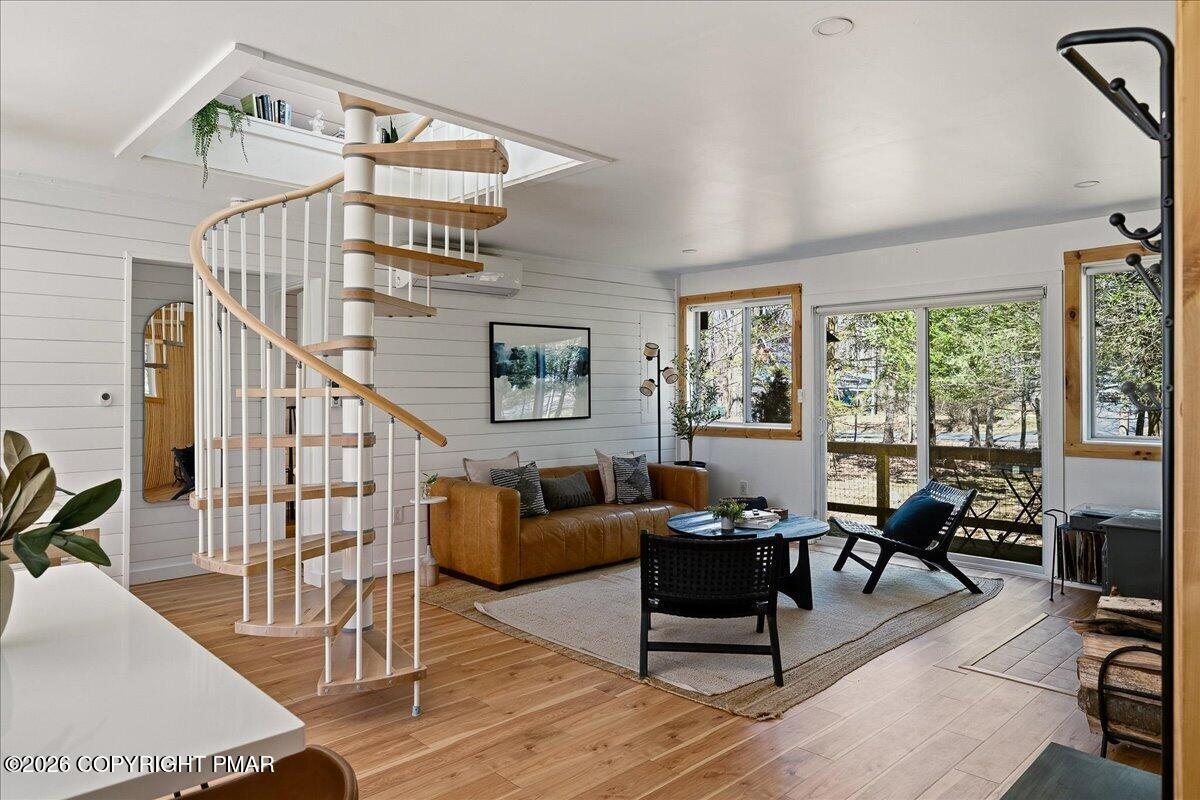 5306 Hummingbird Drive Pocono Summit, PA 18346 - Photo 3 of 32 a living room with furniture and a large window