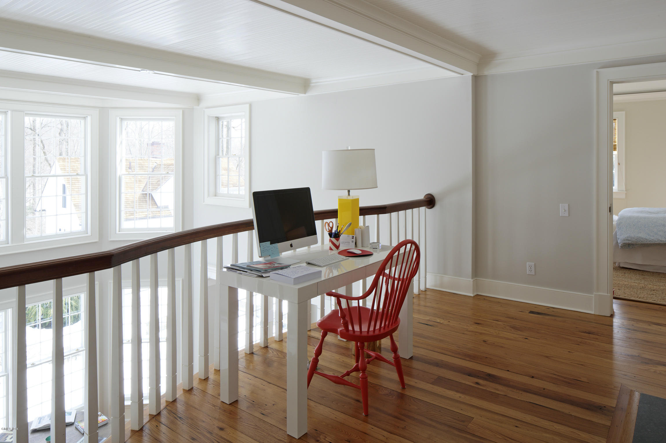 733 Lake Avenue Greenwich, CT 06830 - Photo 13 of 25 a view of a dining room with furniture and wooden floor